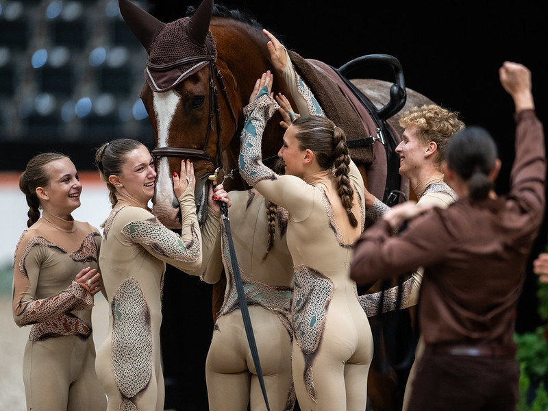 Team MONTMIRAIL of Switzerland pats LIVANTO CHA Junior Squads during FEI Vaulting Championships in Bern Copyright © FEIMartin Dokoupil