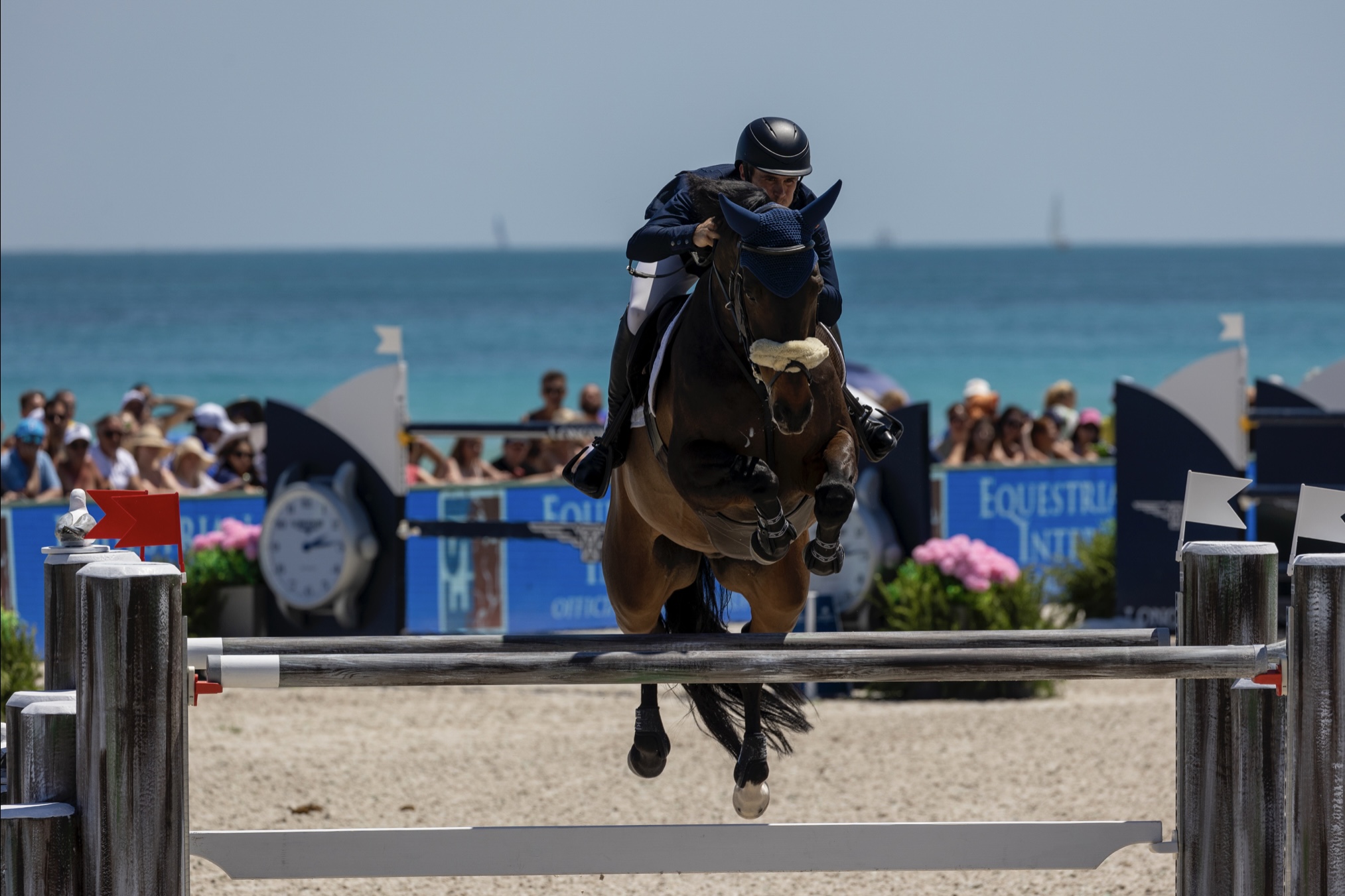 Fernando and Cor Bekker jumping an oxer during the LGCT Miami Beach 2024