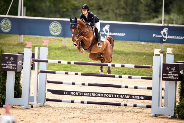 Lily Elliot jumping during a competition