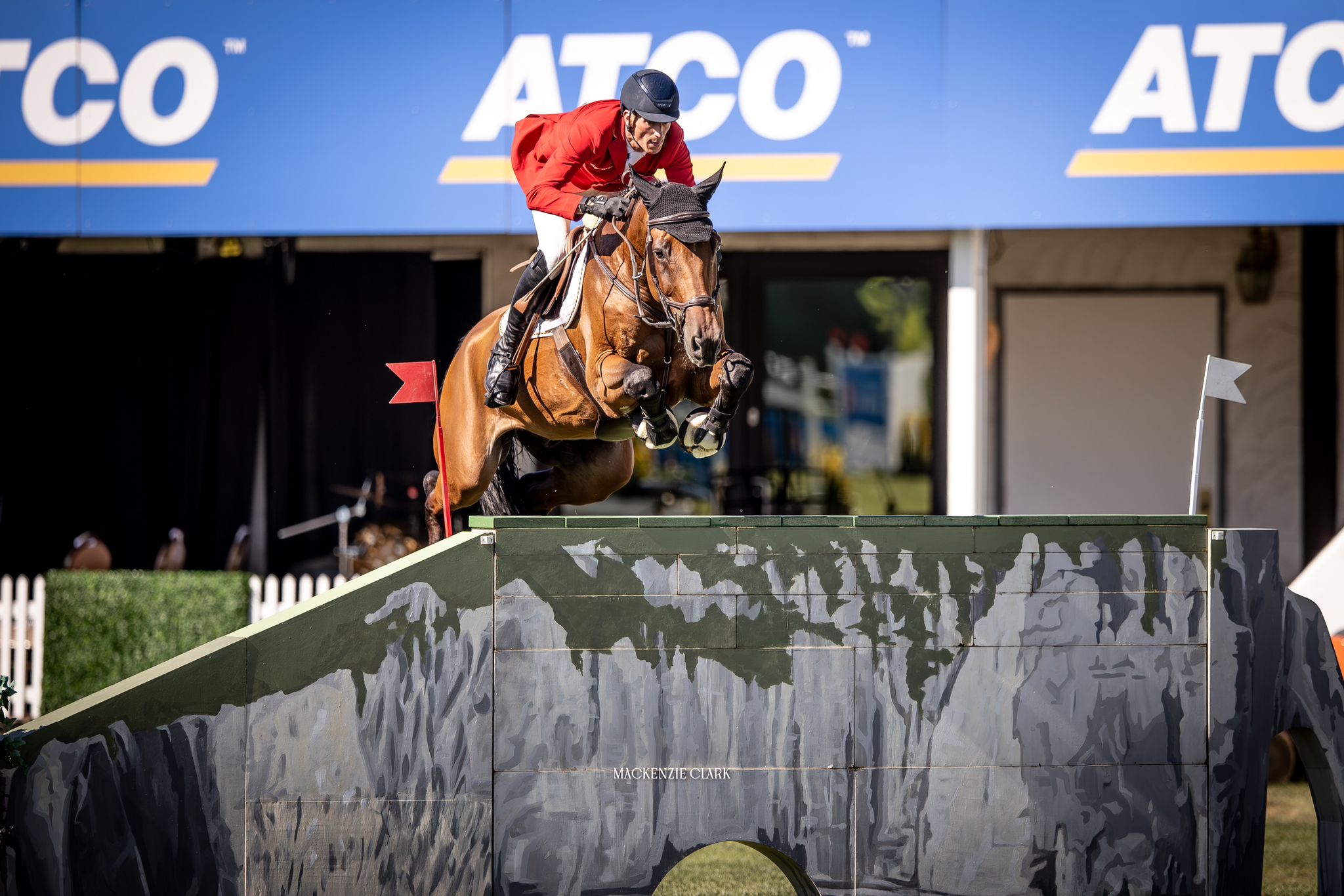 Daniel Deusser jumping at Spruce Meadows