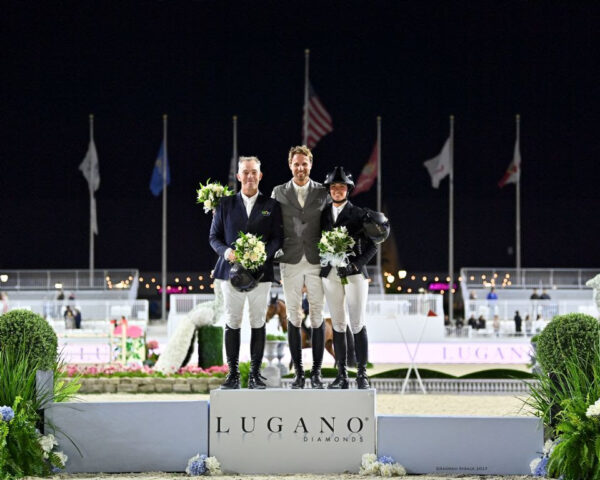 Cian O'Connor, Christian Kukuk, and Nina Mallevaey celebrating on the podium.